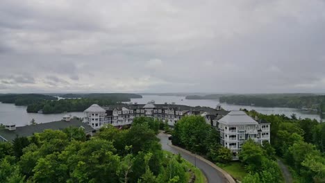 aerial view of lake rosseau on a cloudy day in ontario, canada - drone shot