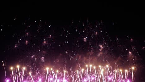 Colorful-fireworks-exploding-in-the-night-sky.-Celebrations-and-events-in-bright-colors.