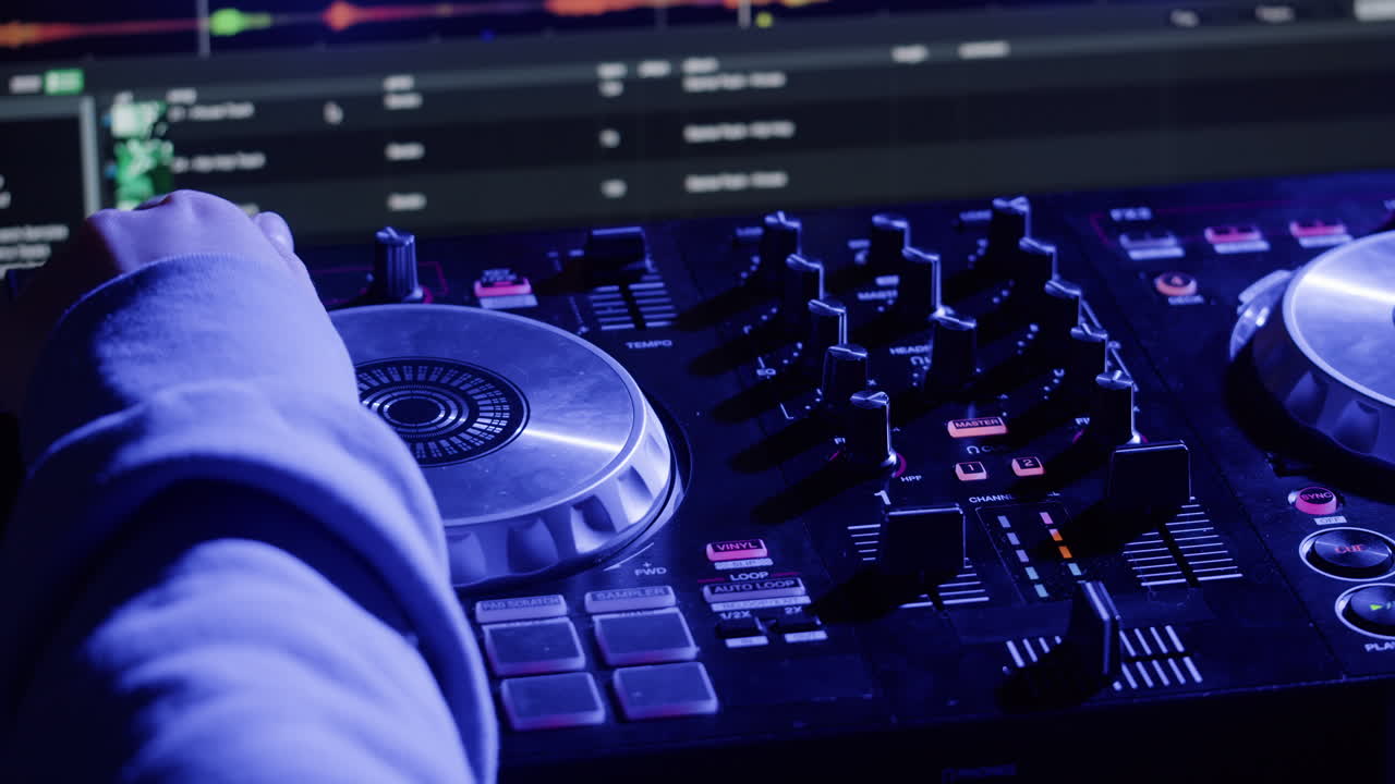 Vibrant DJ Mix Performance Closeup view of hands and equipment during a live music performance, city event, dj set in music techno club