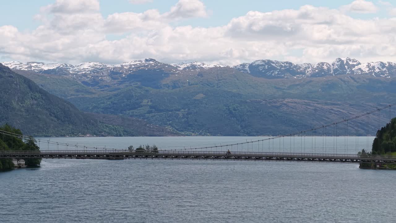Bicycle Across The Fyksesund Suspension Bridge In Vestland County, Norway. Wide Shot