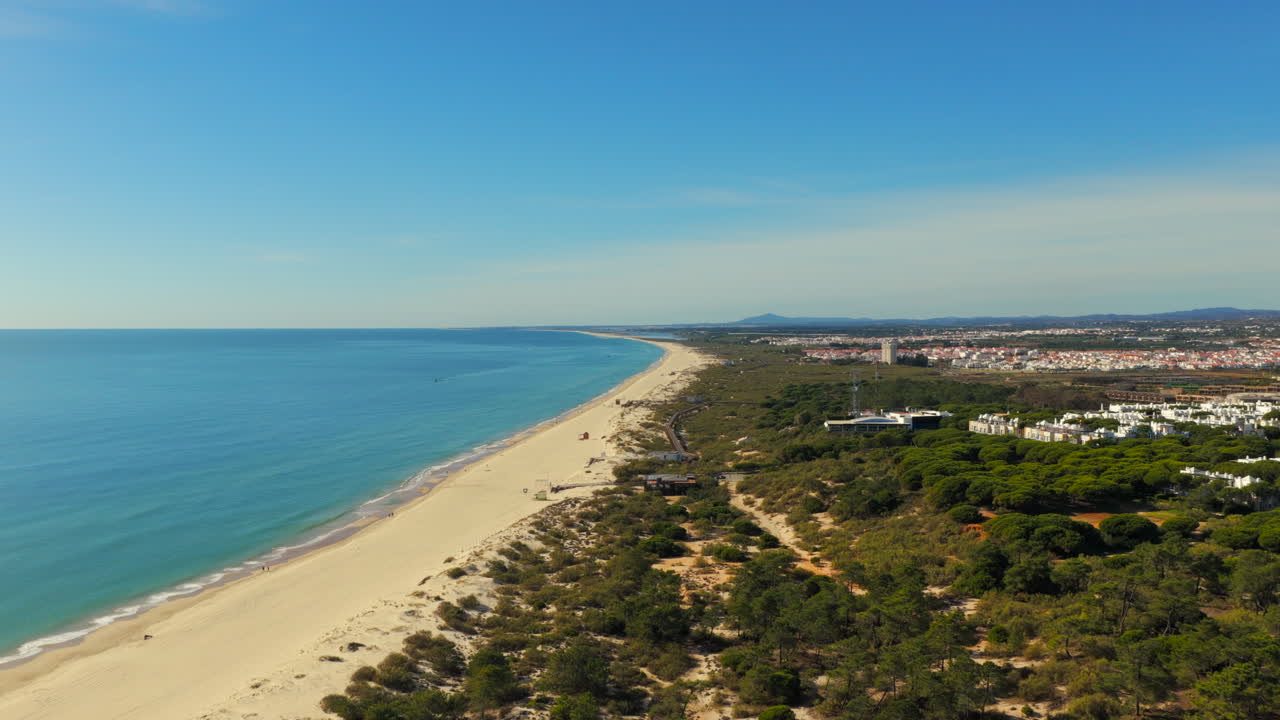 Aerial View of Praia Verde Beach and Pine Forest in Algarve, Portugal