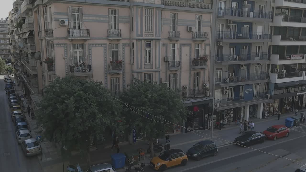 The vibrant daily life of an urban Greek neighborhood in Thessaloniki.