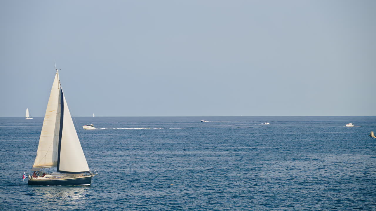 White boats moving on the sea in Antibes, France
