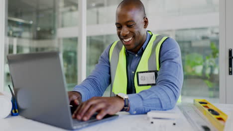 Typing-architect,-laptop-and-happy-black-man