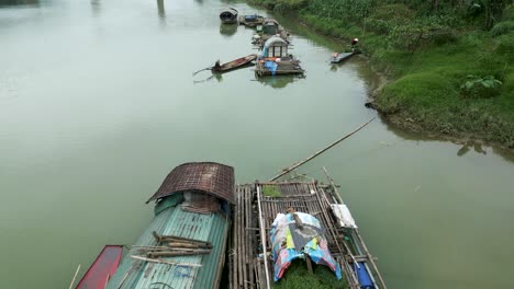 river life in asia: floating homes and boats