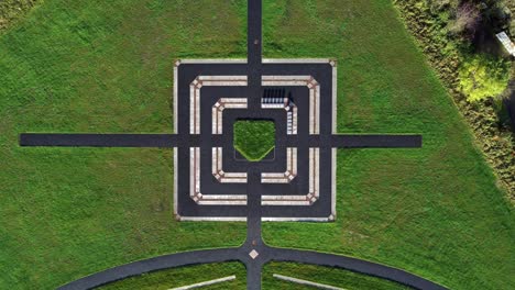 modern square target cemetery pathway design aerial view artistic garden of rest graveyard descending shot