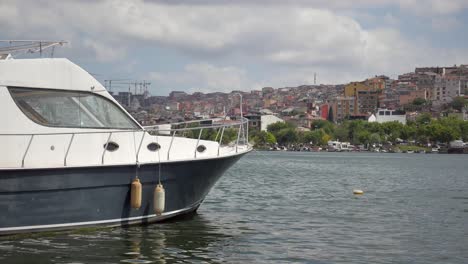 boat docked in a city harbor