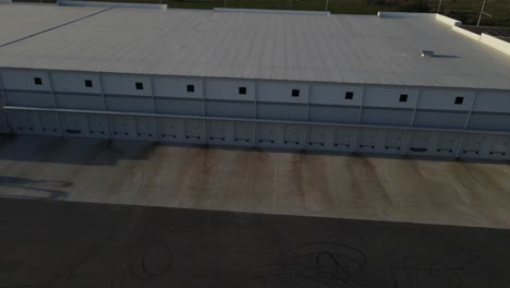 aerial view of new warehouse next to a parking space