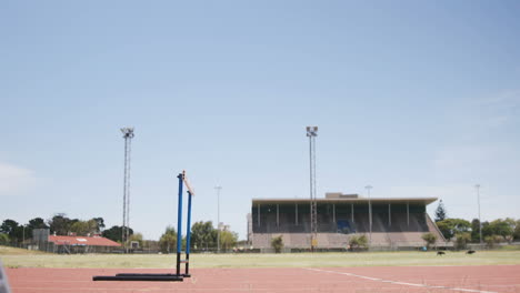 businessman doing hurdle race