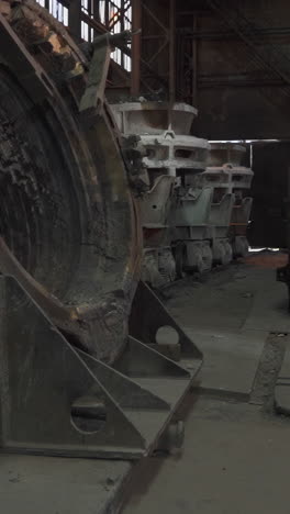heavy industrial equipment in a metal casting foundry