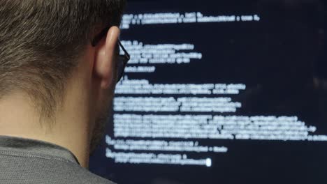 a man focused at his computer, using ai tools to build a website efficiently