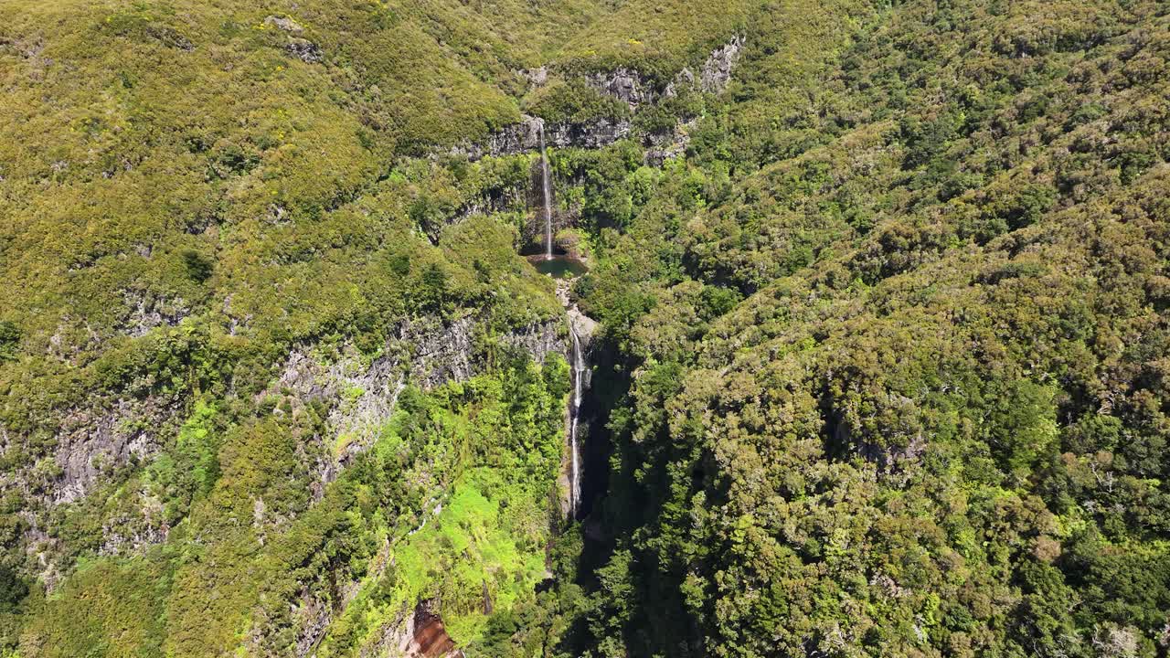 Scenic Risco falls in lush landscape of Rabacal area on Madeira island, aerial