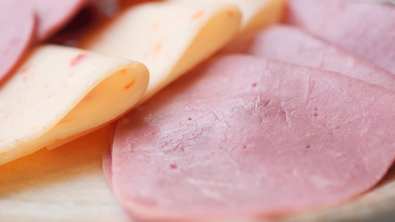 Slices of Processed Cheese and Ham