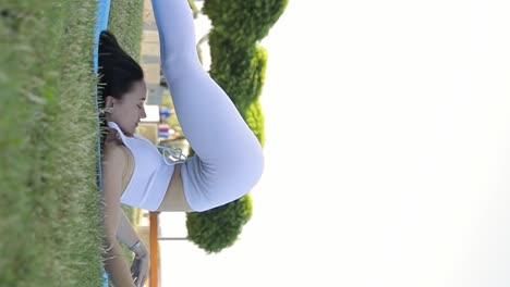 a woman practices yoga alone in a scenic park environment a woman practices yoga alone in a scenic park environment meditating european sportswoman enjoying an active morning outdoors