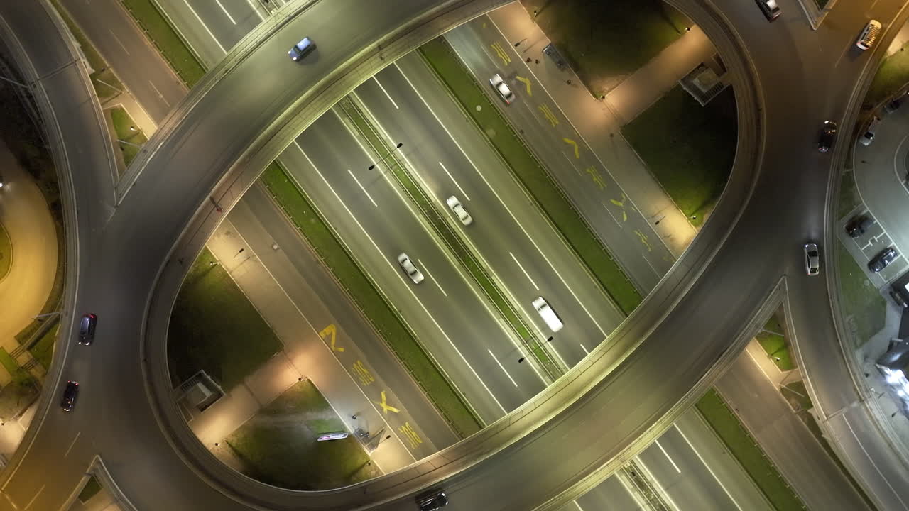 Aerial View of Busy Highway Interchange at Night