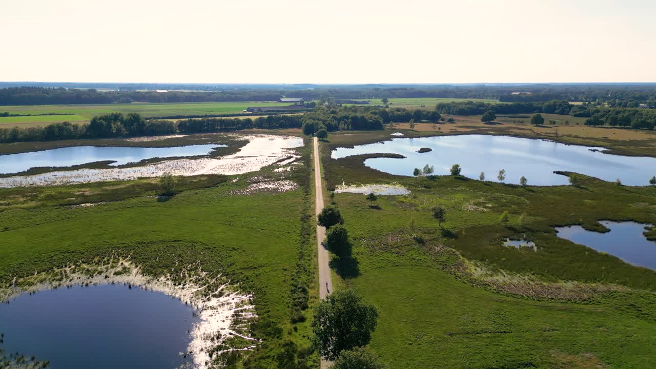 Aerial View of Dutch Landscape with Lakes and Road