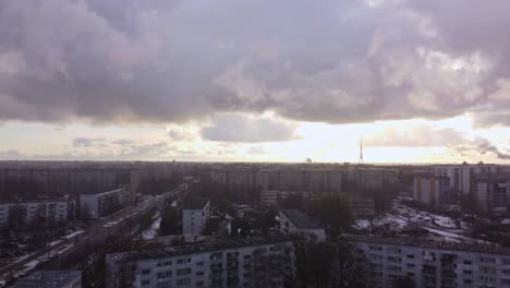 Nostalgic-post-soviet-union-apartment-buildings-in-aerial-view-during-snowfall