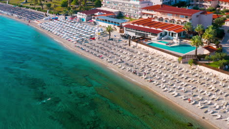 Drone-view-of-beach-in-Hanioti-,-Greece