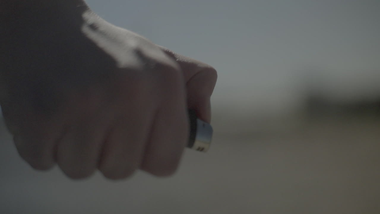 Person Holding a Lighter