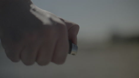 person holding a lighter