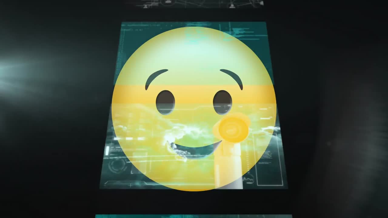 Digital animation of winking face emoji against screens with data processing on black background