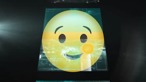 Digital-animation-of-winking-face-emoji-against-screens-with-data-processing-on-black-background