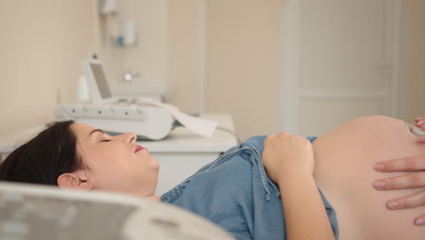 pregnant woman undergoing ultrasound