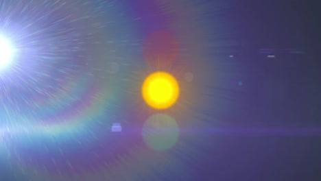 digital animation of colorful light spots moving against dark background