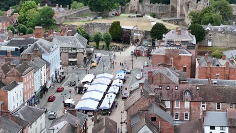 market square ludlow england aerial pull back reveal castle