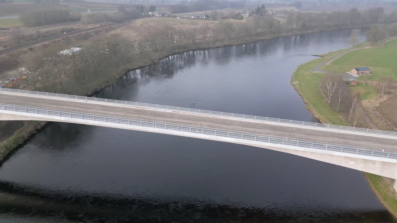 Drone view over river Tay showcasing the new bridge before the opening date. Sunny day