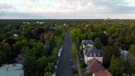 big sky green area buttery soft aerial view flight slowly tilt down drone footage of argentinische allee mexikoplatz berlin zehlendorf summer 2022 cinematic from above tourist guide by philipp marnitz