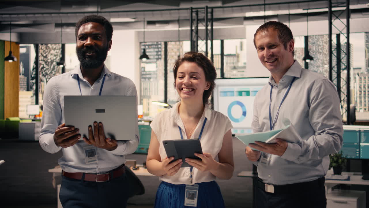 Portrait of work team analyzing data analysis results and KPI metrics