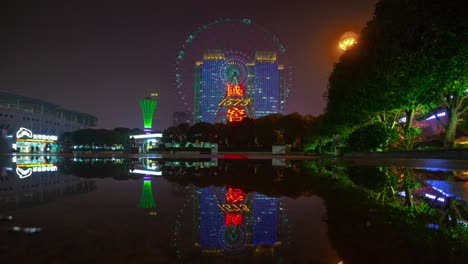 night illumination changsha city famous ferris wheel stadium park water reflection panorama timelapse 4k china