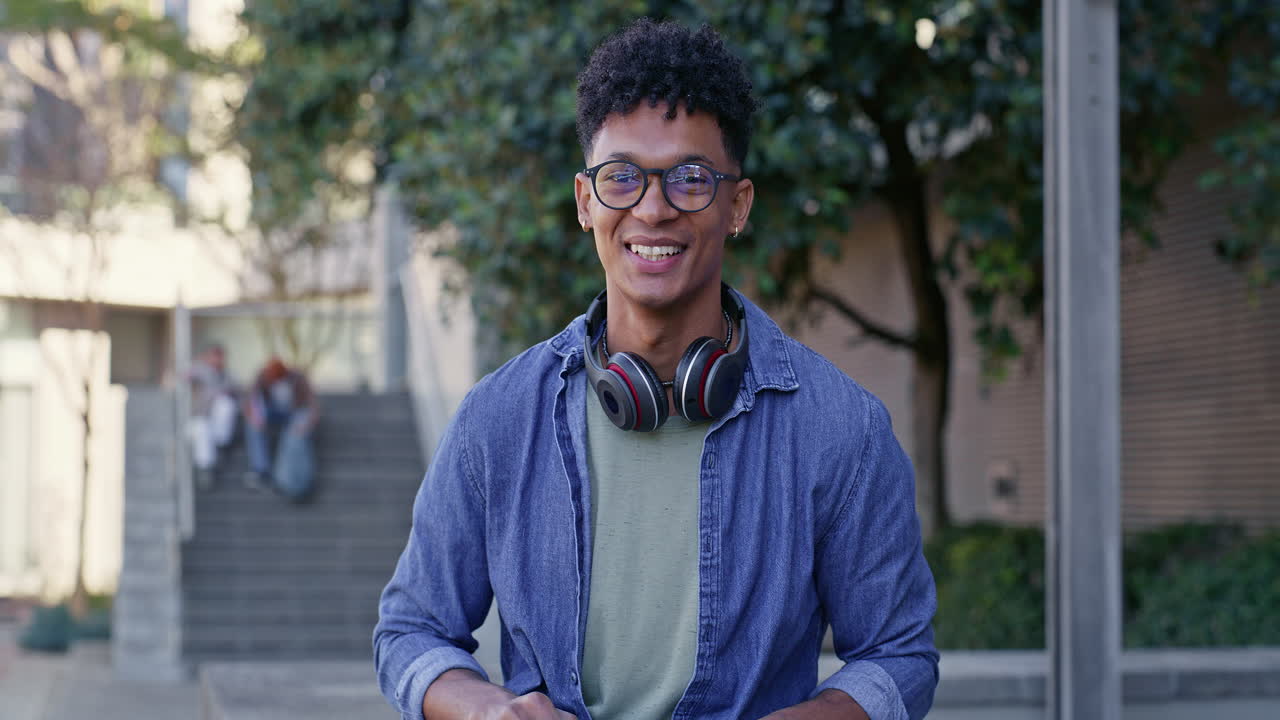 College student working on laptop outdoors