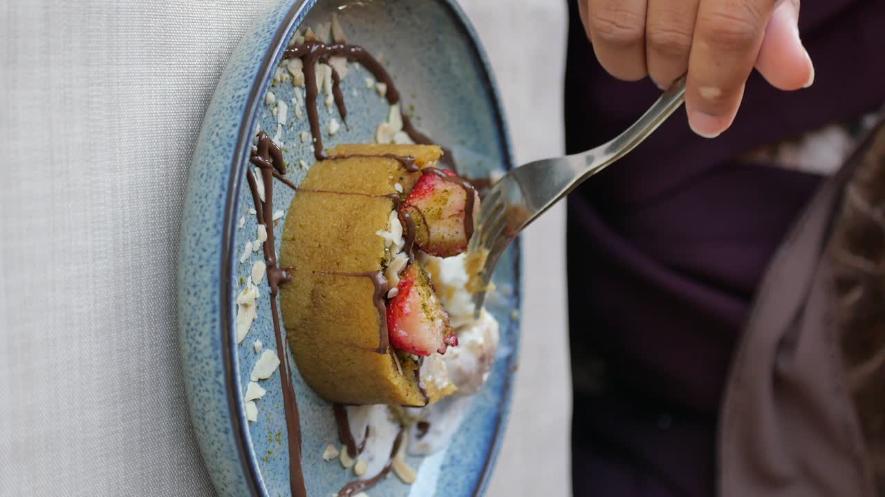 Dessert with strawberry, chocolate, and almonds