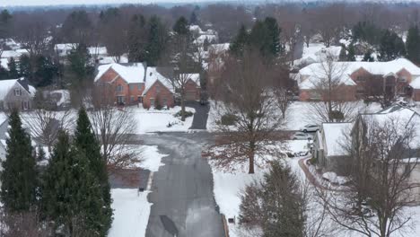 aerial of large red brick home