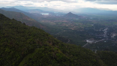 Shot-from-Vietnamese-Highlands-over-Da-Lat-city-and-green-hills-in-Vietnam-highlands-at-daytime