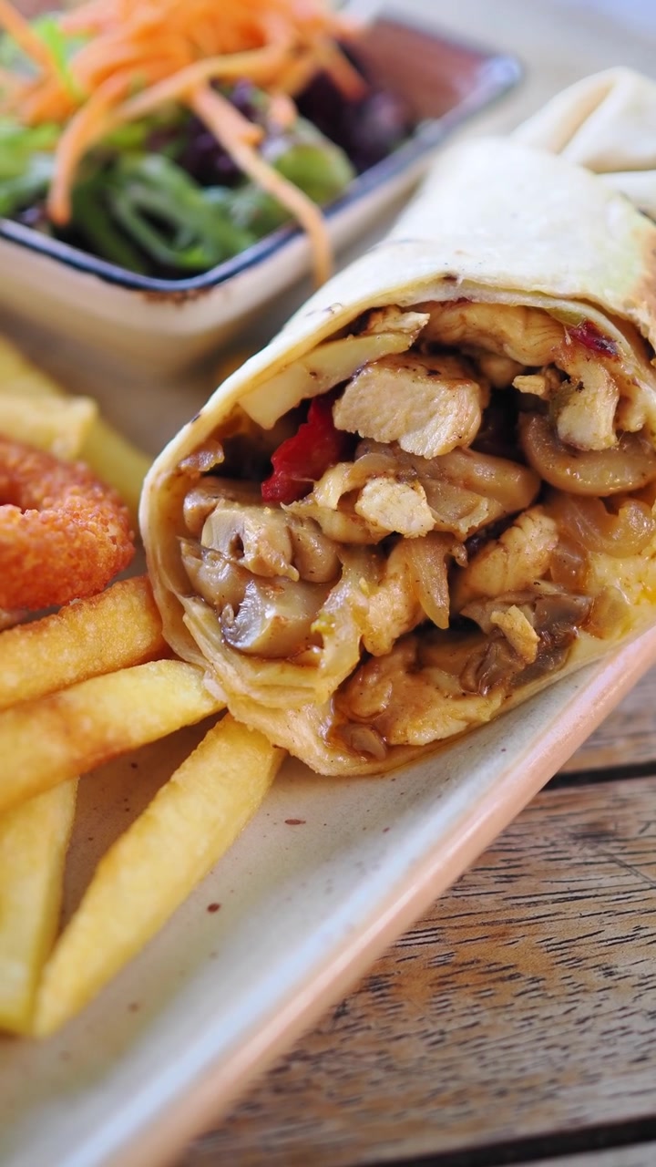 Chicken Wrap Served with French Fries and Side Salad