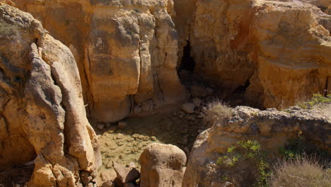 sandstone formations at the beach in algarve, portugal in summer