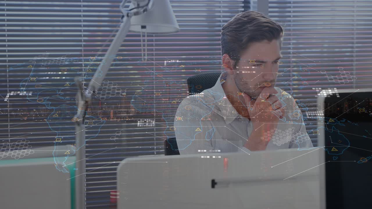 Animation of data processing over businessman using computer in office