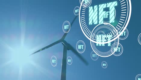 Animation-of-falling-nft-icons-over-windmill