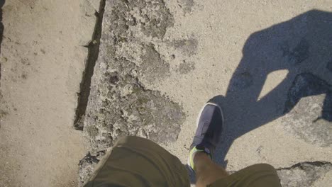 person walking on a rocky path