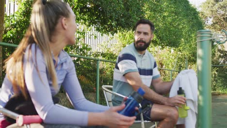 video of happy caucasian couple on having break the court