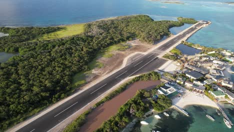 The-new-airstrip-in-gran-roque,-los-roques,-venezuela,-with-clear-ocean-waters,-aerial-view