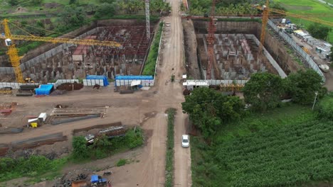 commercial building work is going on connecting road of urban city