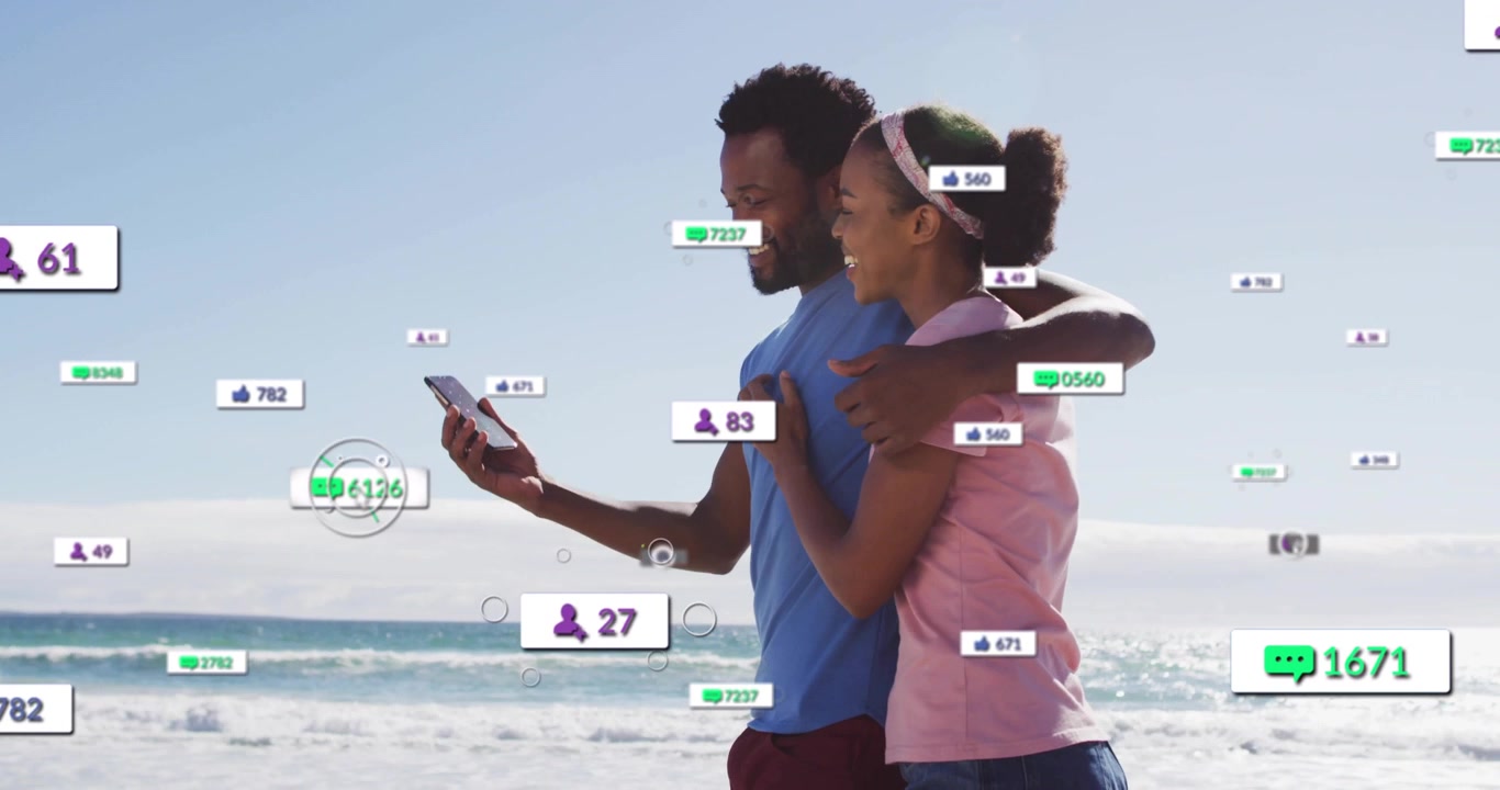 Couple walking beach starting floating social media icons climbing as cheering and capturing selfie