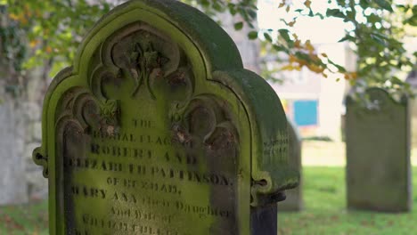ancient gravestone in a churchyard