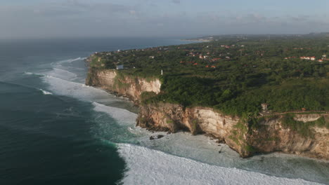 aerial of uluwatu's coastline in bali - one of the best surf destinations in the world