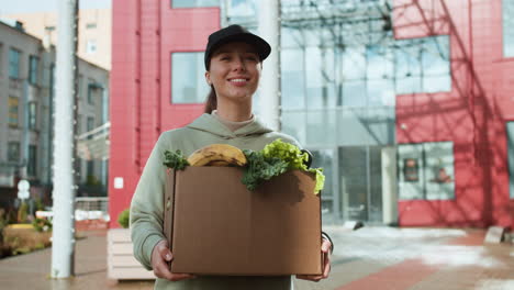 Courier-holding-box-outdoors