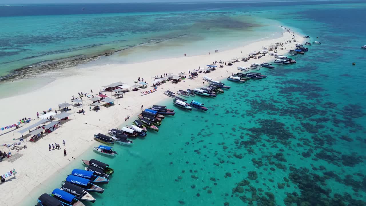 Drone view of Nakupenda Island Tanzania with turquoise water and white sand